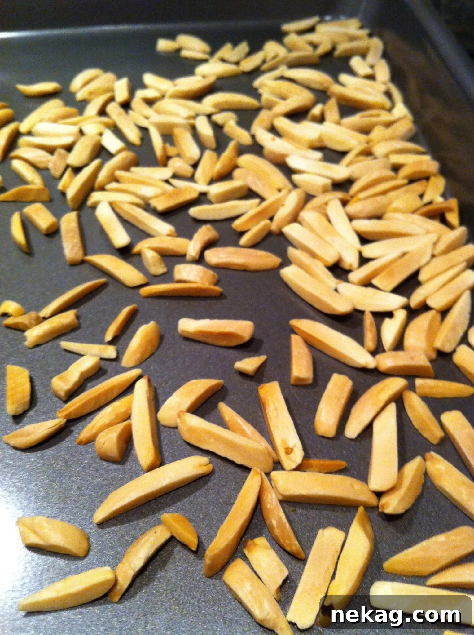 Country Captain: A Legendary Heritage Chicken Curry 5 Close-up of golden brown toasted almond slivers, ready to be sprinkled over Country Captain Chicken Curry.