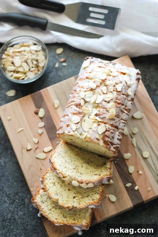 Golden Almond Poppy Seed Loaf 2 Delightfully moist Almond Poppy Seed Bread, bursting with sweet almond flavor and tender poppy seeds, perfect for any occasion.