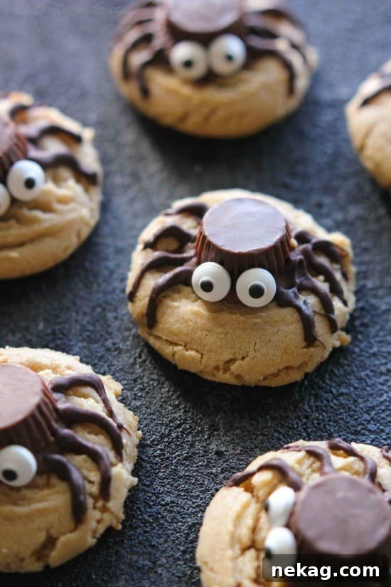Freshly baked peanut butter cookies ready for Reese's cups