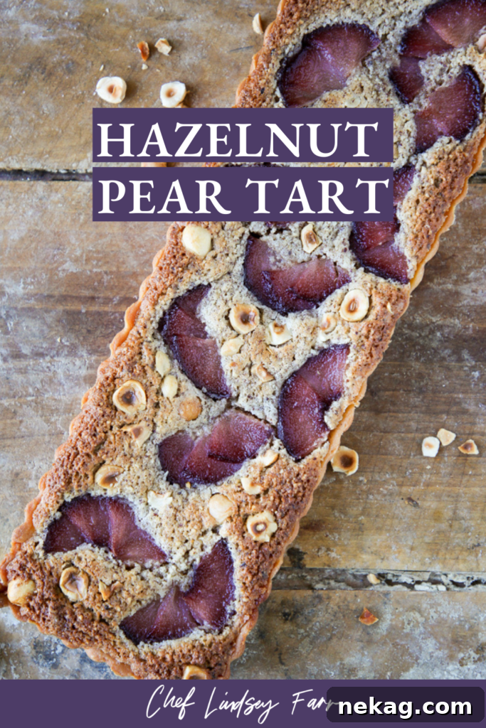 Another angle of the Hazelnut Pear Tart, showcasing its glossy finish and inviting texture.