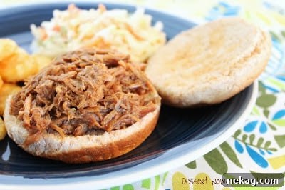 Shredded root beer pulled pork in a slow cooker