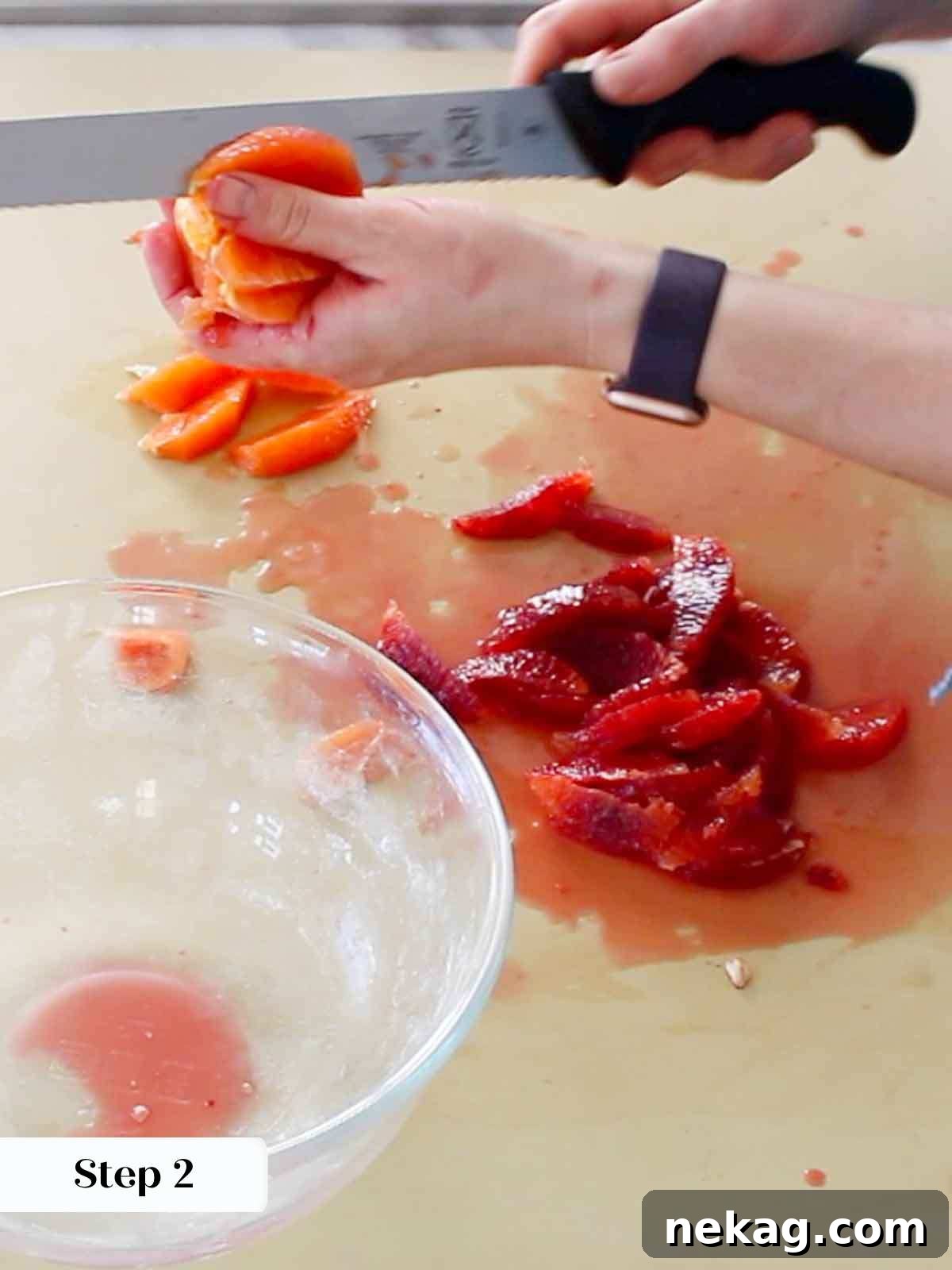 Slicing elegant orange supremes for a beautiful cake topping.