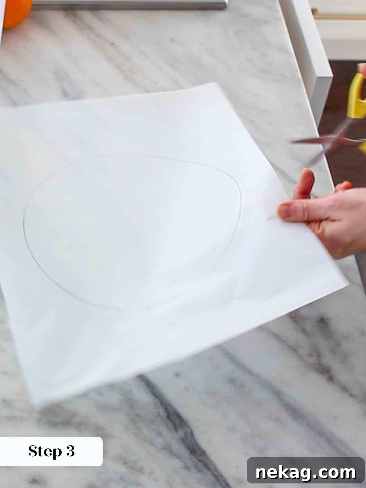Precisely cutting a parchment circle to fit the cake pan.