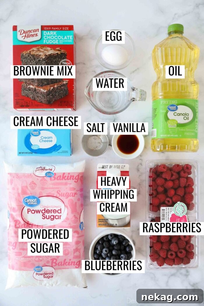 A visual guide to the ingredients needed for the 4th of July Fruit Pizza, including a brownie mix box, eggs, oil, cream cheese block, powdered sugar, vanilla extract, heavy whipping cream, fresh raspberries, and blueberries.