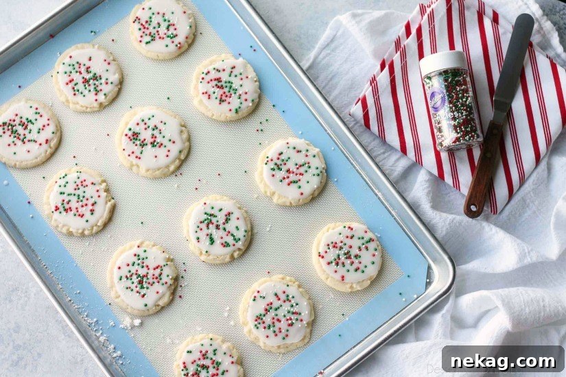 Perfect Christmas Meltaway Cookies 6 Platter of Christmas Meltaway Cookies with a thin white glaze and red and green sprinkles