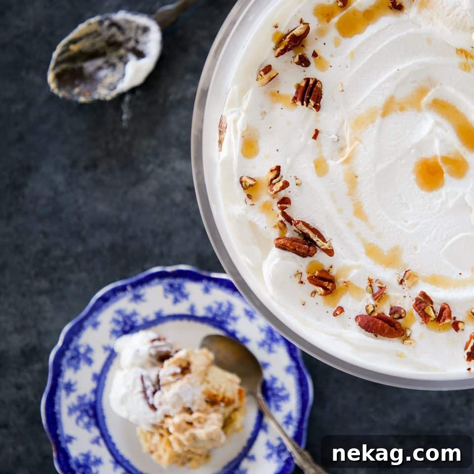 Maple Pumpkin Trifle, showcasing beautiful layers of pumpkin cheesecake and maple pound cake.