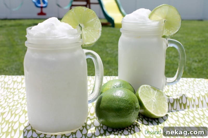 A delicious Frozen Coconut Limeade drink, ready to be served and enjoyed on a hot day.