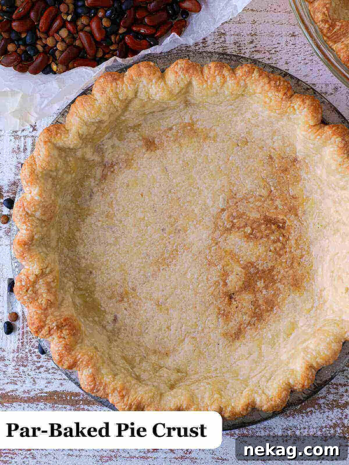 Decadent Chocolate Pecan Pie 8 Image of a perfectly par-baked pie crust, showcasing a golden-brown hue and firm structure, ready for its filling.