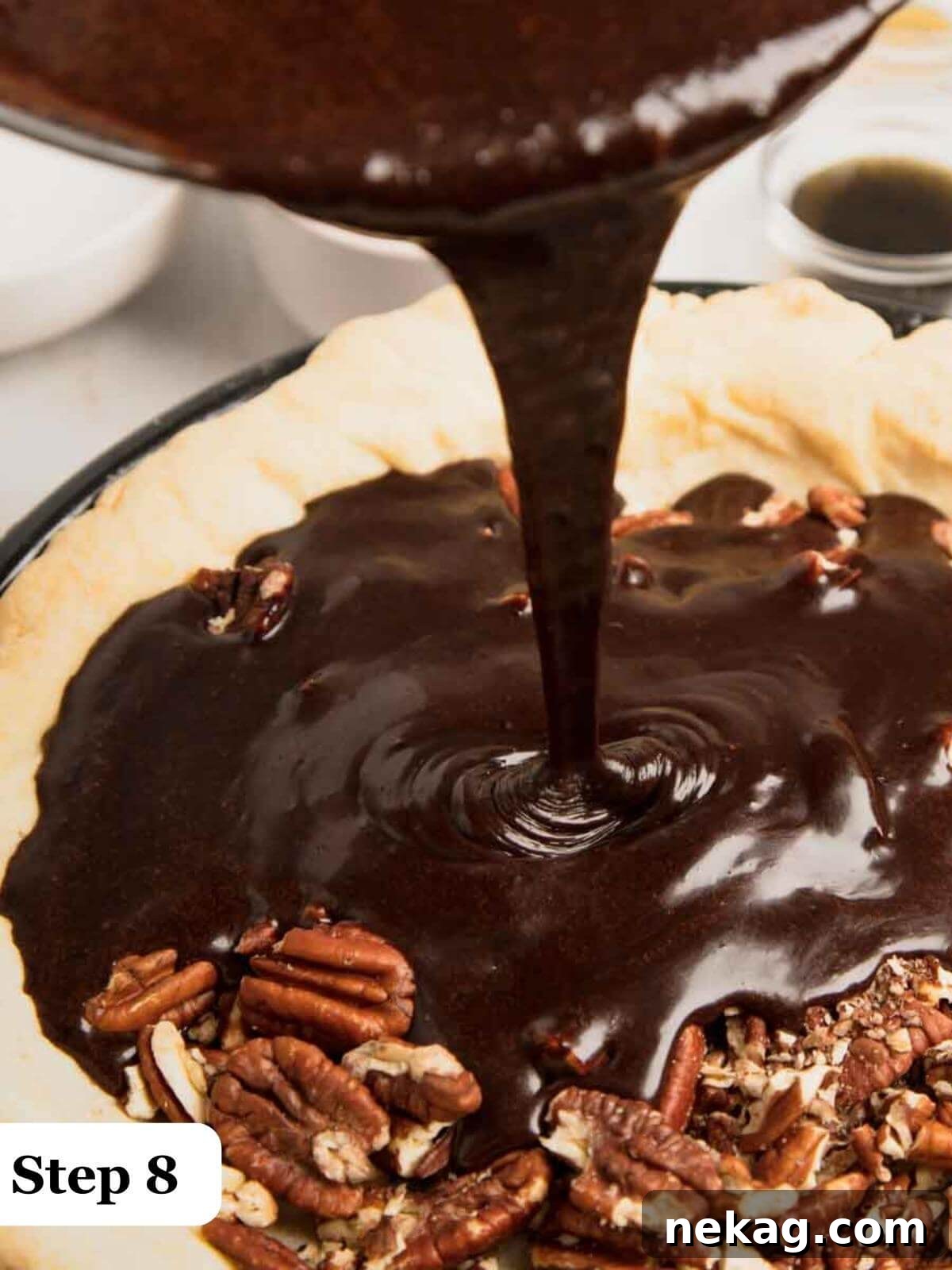 Decadent Chocolate Pecan Pie 9 Step-by-step image showing the rich chocolate pecan pie filling being poured into a golden, par-baked pie shell.
