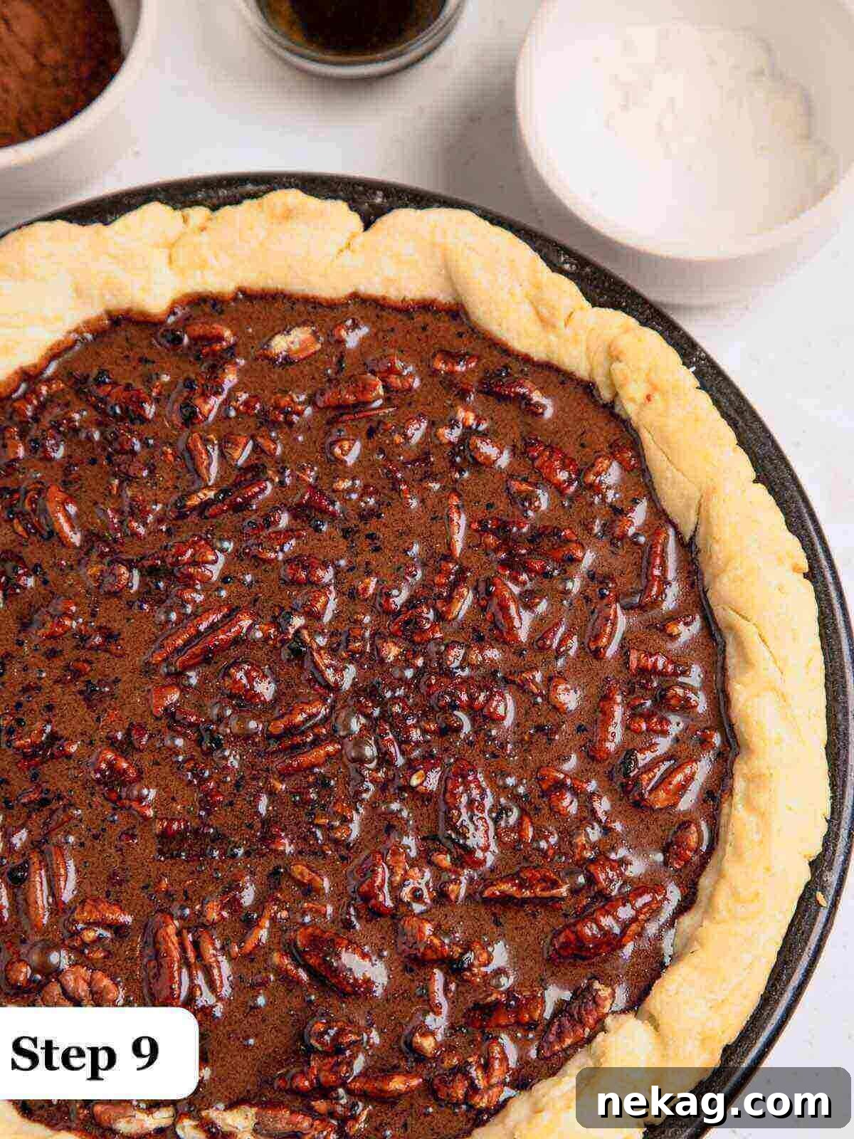 Decadent Chocolate Pecan Pie 10 Step-by-step image displaying the chocolate pecan pie immediately after being removed from the oven, still slightly puffed and warm.