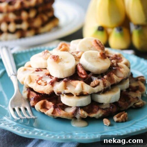 Delicious Banana Nut Cinnamon Roll Waffles with maple cream cheese drizzle.
