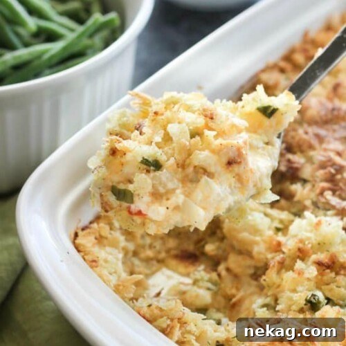 Close-up of Funeral Potatoes with a crunchy topping and melted cheese.