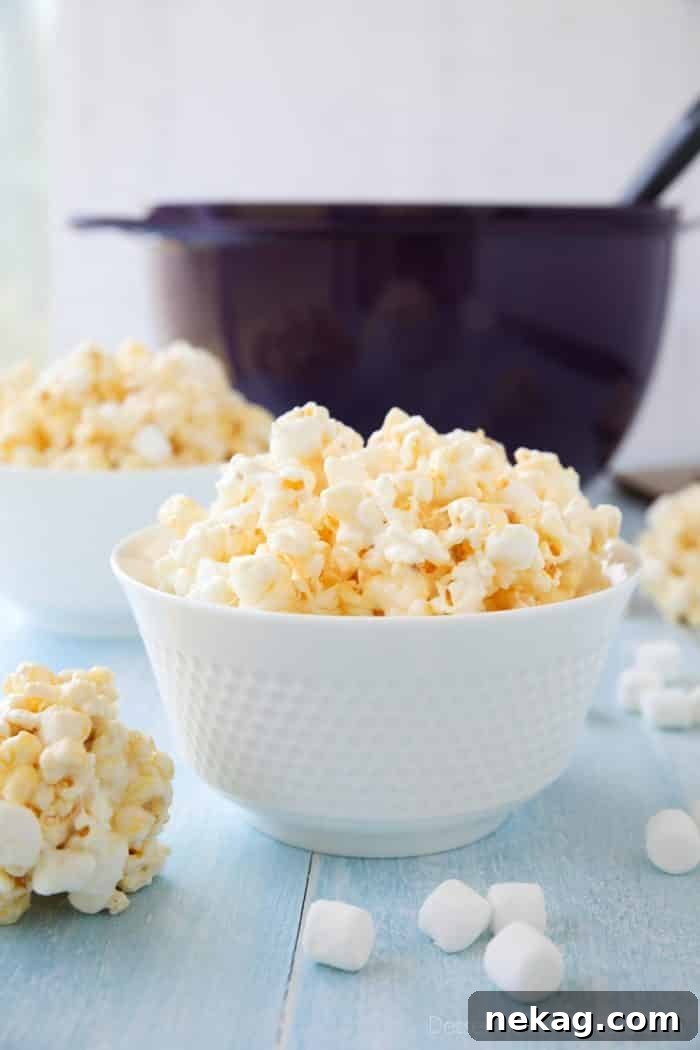 Marshmallow Popcorn is easy to make and can be eaten plain or shaped into popcorn balls.