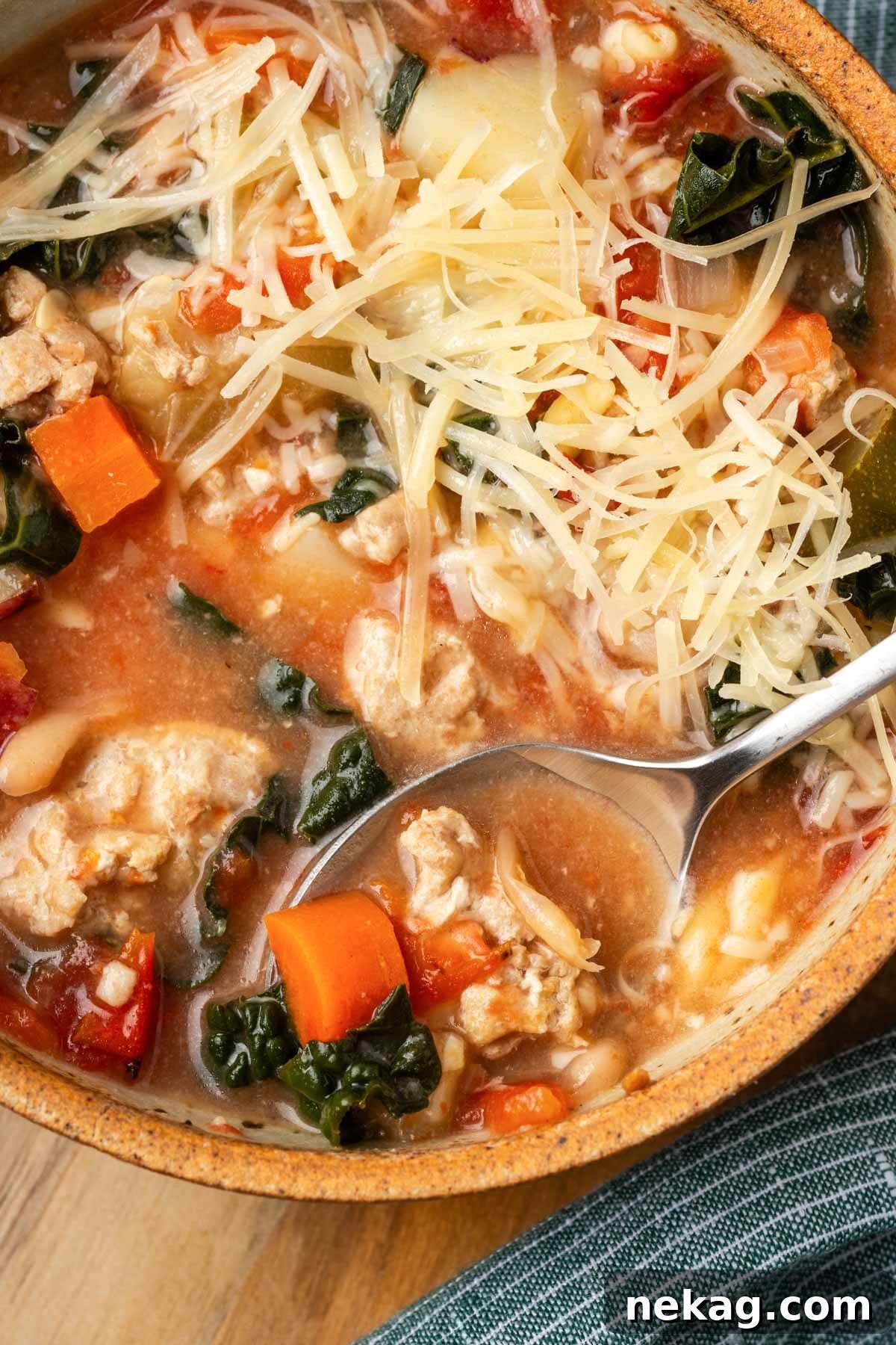 Hearty Ground Turkey Soup 2 ground turkey soup in brown bowl.