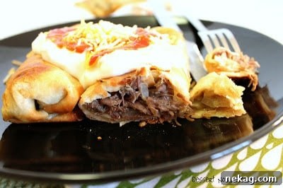 Golden-brown chimichangas filled with chili verde beef
