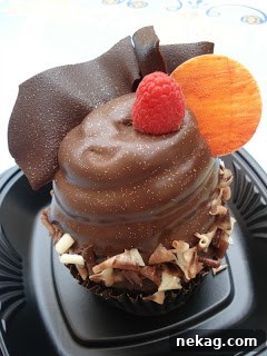 My Disney Magic Revealed 5 Close-up of the exquisitely decorated chocolate raspberry cupcake with edible glitter