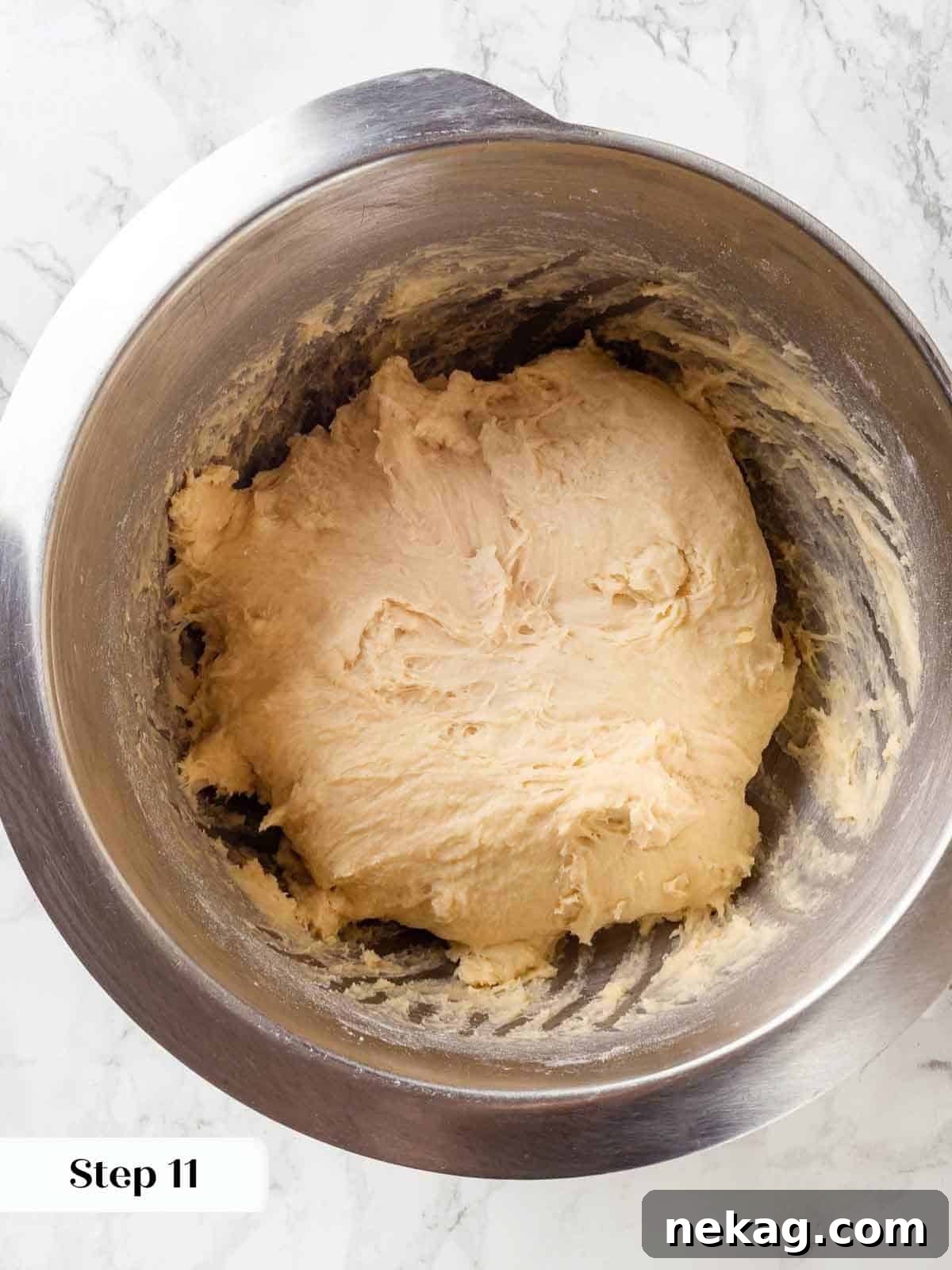 Tender Potato Loaf 9 Flour and sugar added to a mixing bowl with wet ingredients.