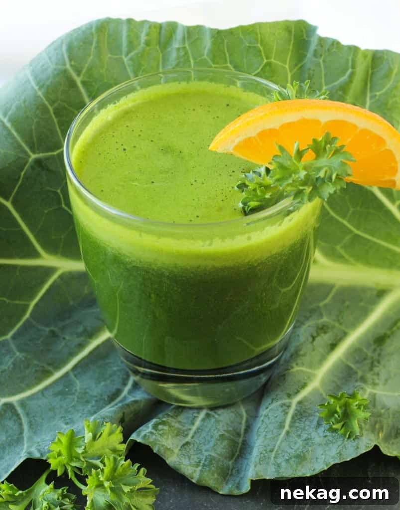 Freshly prepared Kale Power Juice in a tall glass, garnished with a kale leaf