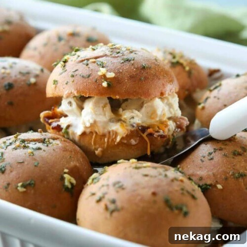Chicken Bacon Ranch Sliders are perfect for dinner or the big game! Quick and easy to make with leftover chicken. Plus, they taste great!