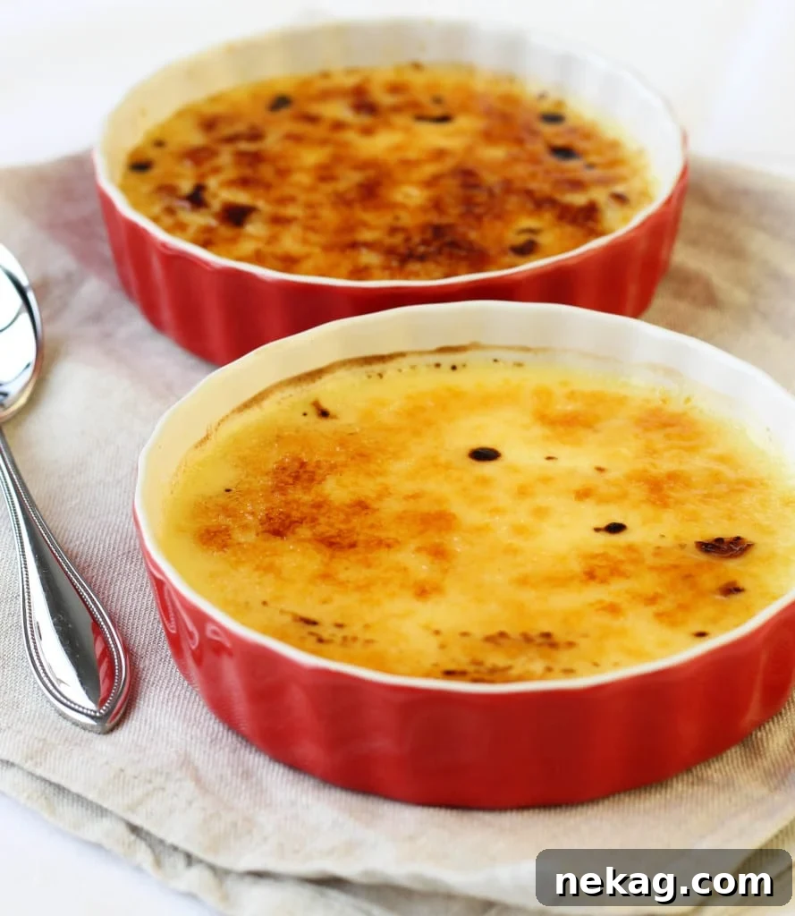 Classic Crème Brûlée with a perfect caramelized top, ready to be cracked open.