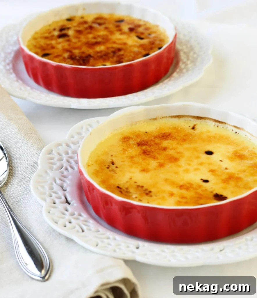Two Crème Brûlée ramekins, perfectly portioned for a romantic dessert.