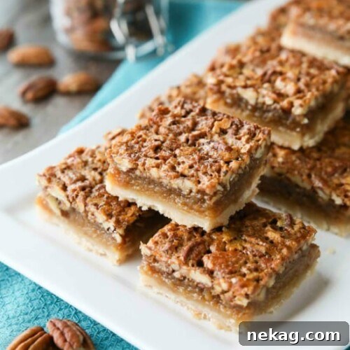 Delicious Pecan Pie Bars, ready to be enjoyed as a holiday treat.
