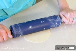 Whip Up Your Own Flour Tortillas 4 Small balls of tortilla dough resting on a floured surface