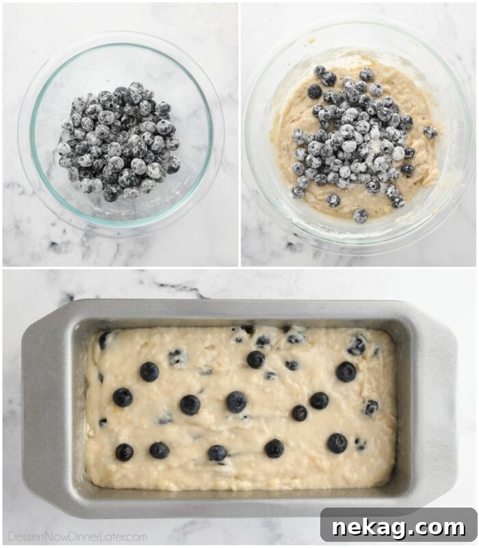 Berry-Kissed Banana Bread 5 Adding flour-coated blueberries to the banana bread batter in a large bowl, ready for gentle folding.