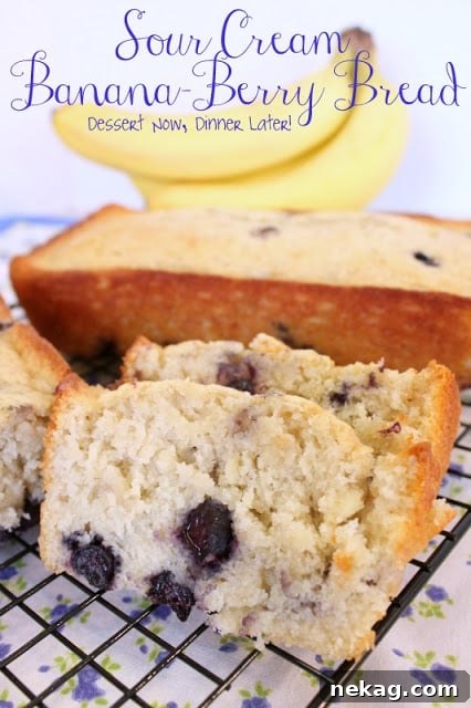 Berry-Kissed Banana Bread 9 Several slices of moist sour cream banana blueberry bread stacked on a wire cooling rack, ready to be enjoyed.