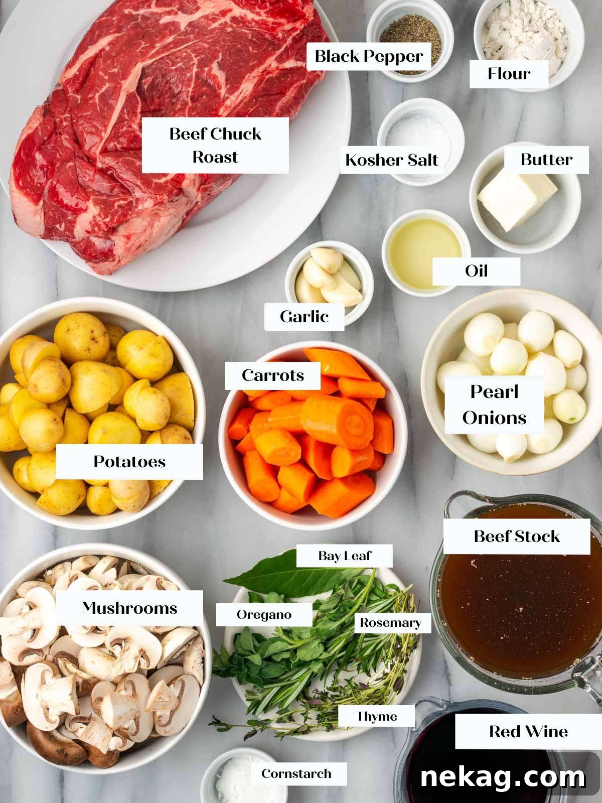 pot roast ingredients laid out on white marble counter.