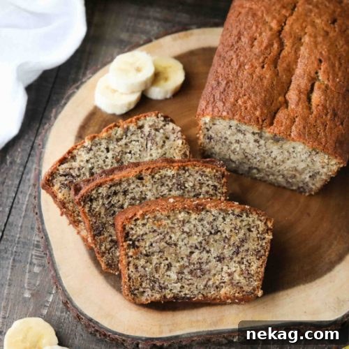 Delicious classic banana bread loaf with a golden crust, perfect for sharing.