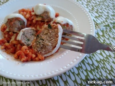 Saucy Chicken Parmesan Meatballs with Noodles 5 Chicken Parmesan Meatballs topped with melted mozzarella and fresh basil