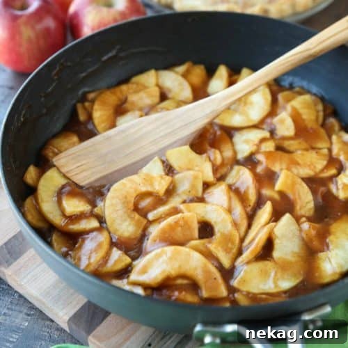Homemade Apple Pie Filling is easy, delicious, and freezes well! Use it for apple pie, apple crisp, or any dessert that uses canned apple pie filling. Stays freezer fresh up to 12 months!