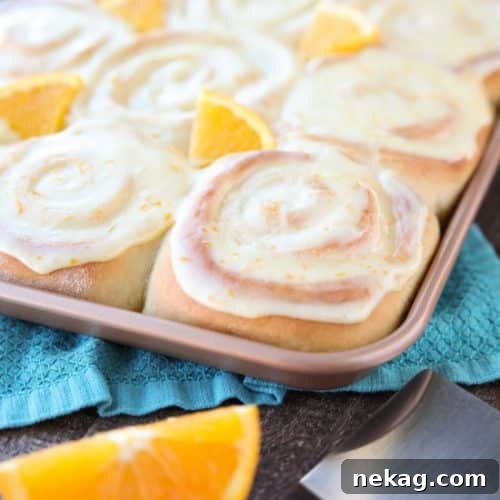 Zesty Orange Swirls 2 Orange Rolls are a delicious sweet roll made with a soft and fluffy potato dough filled with a zest-infused sugar and topped with a fresh orange glaze. Perfect for breakfast, weekend brunch, or holidays -- like Easter.