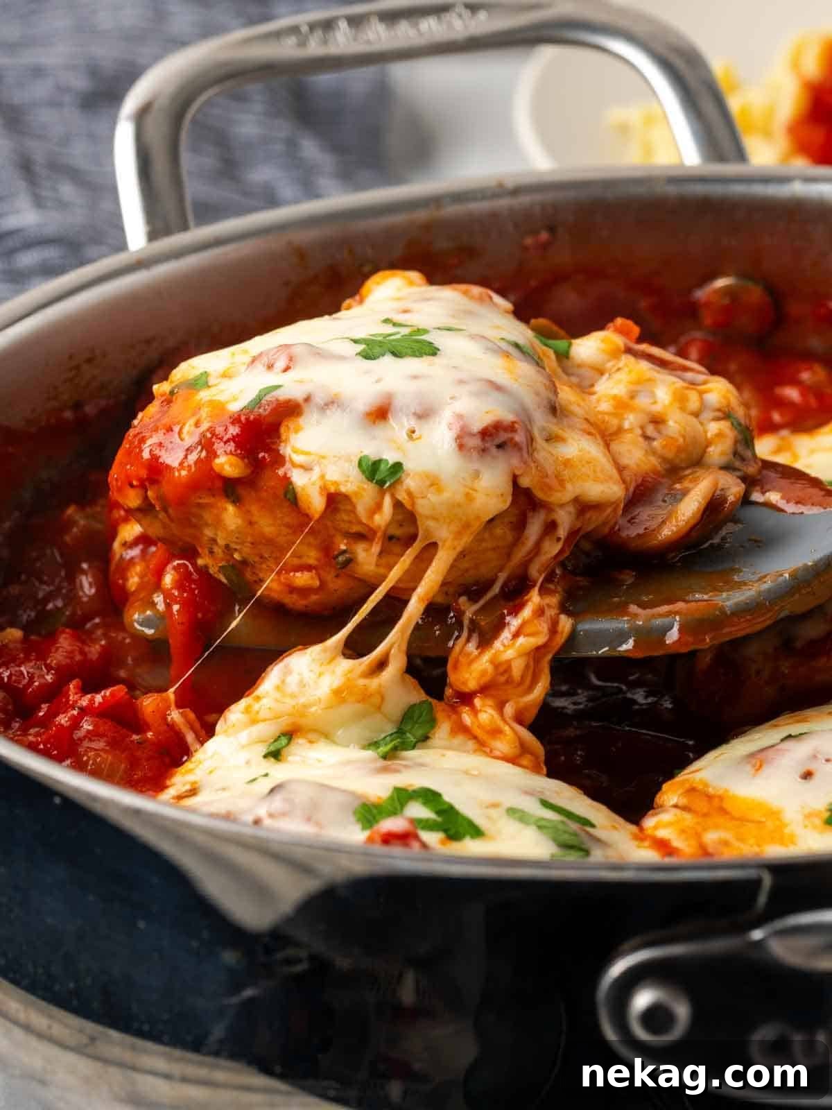 Rustic Marinara Chicken Bake 3 cheese pull from a delicious chicken breast in rich tomato sauce.