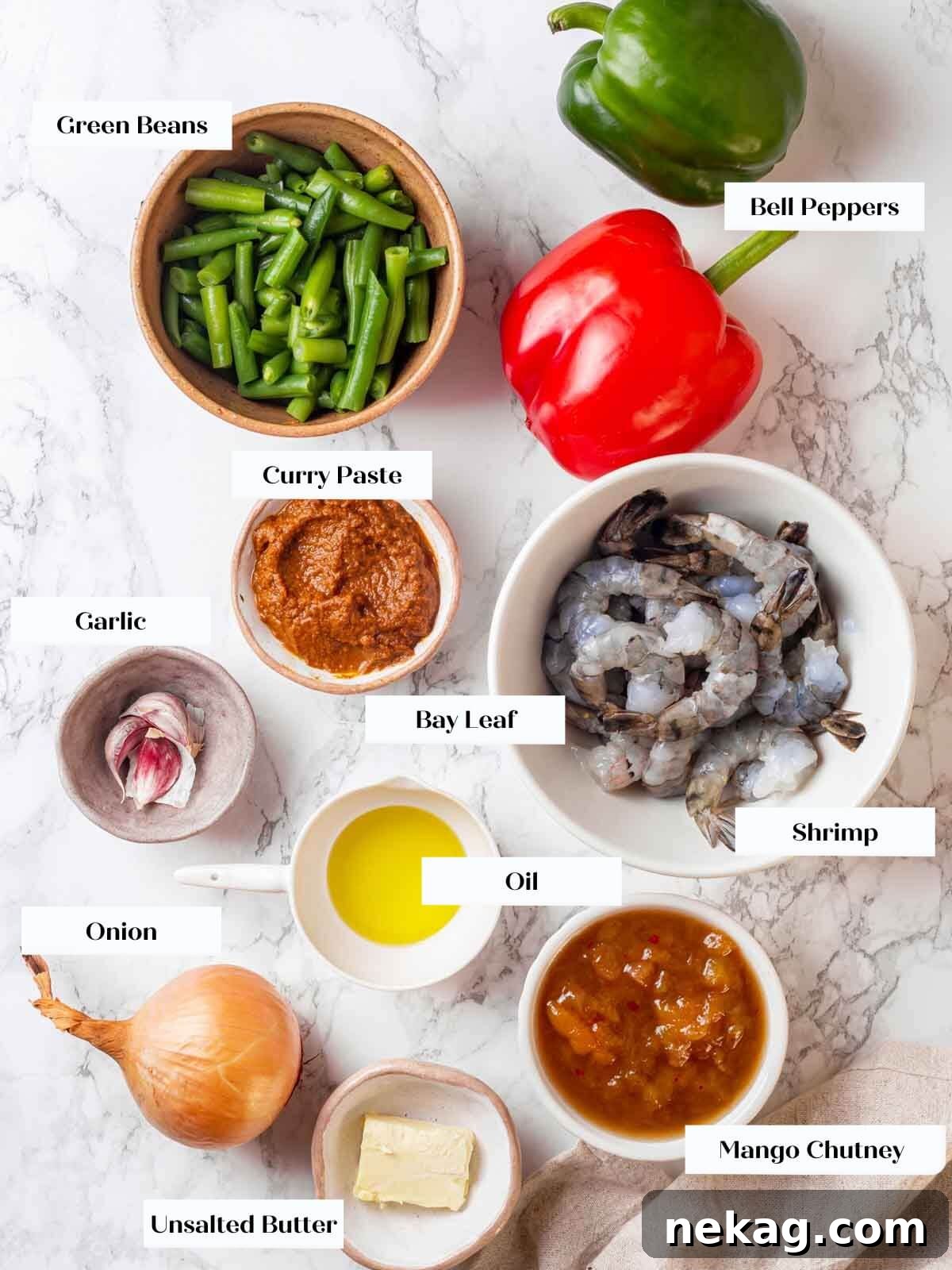 A vibrant selection of fresh ingredients laid out for the curry portion of the dish.