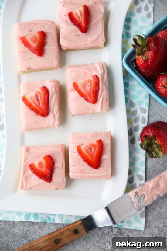 Strawberry Dream Bars 4 Strawberry Sugar Cookie Bars - soft, moist sugar cookie bars are topped with a natural strawberry frosting. Super easy to make and serves a crowd!