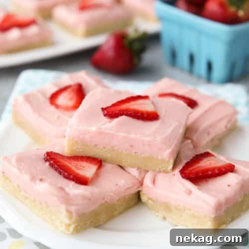 Strawberry Dream Bars 7 Strawberry Sugar Cookie Bars - soft, moist sugar cookie bars are topped with a natural strawberry frosting. Super easy to make and serves a crowd!