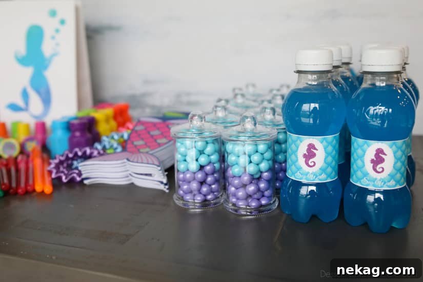 Magical Mermaid Tail Pull Apart Cupcakes 16 Mermaid party favor bags containing a candy jar of edible chocolate pearls and 'sea water' mini soda bottles.