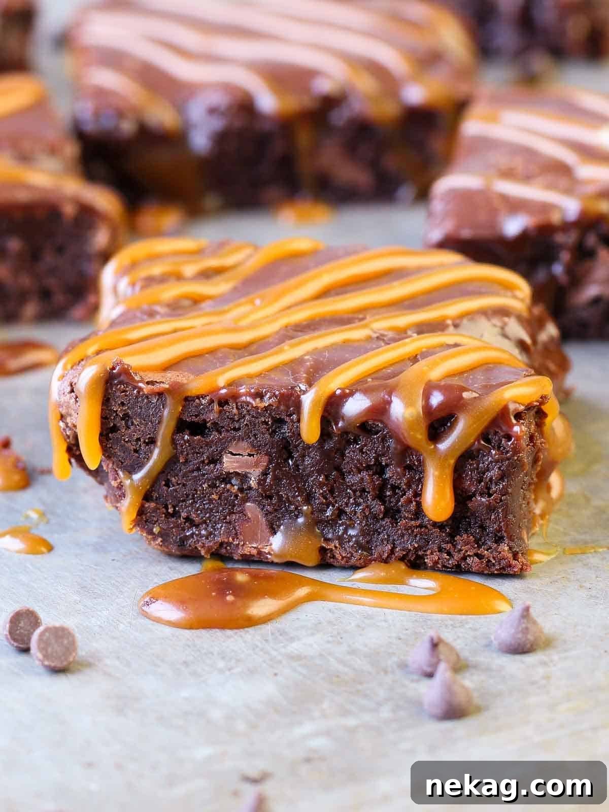 Decadent Caramel Brownies 6 Delicious caramel brownies cooling in a pan, ready to be cut and served.