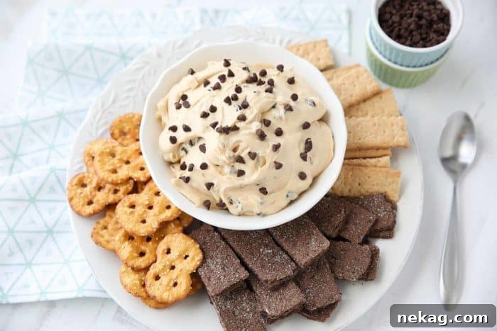 Decadent Buckeye Dip 6 Buckeye Dip is the perfect appetizer or snack for parties, holidays, or game day. This dessert dip is full of peanut butter and chocolate chips and goes well with graham crackers, pretzels, or fruit - like apples.