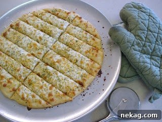 Close-up of golden brown garlic cheese sticks