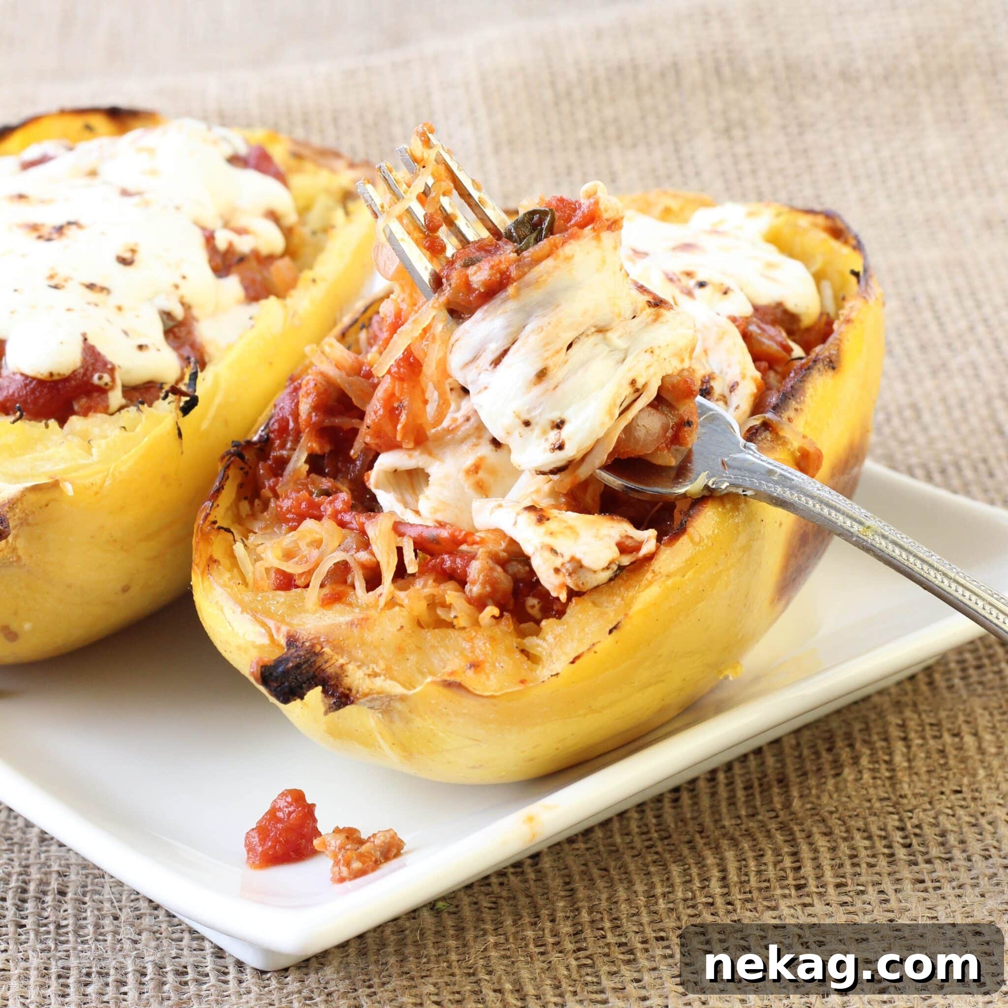 Close-up of golden-brown melted mozzarella cheese on Twice Baked Spaghetti Squash