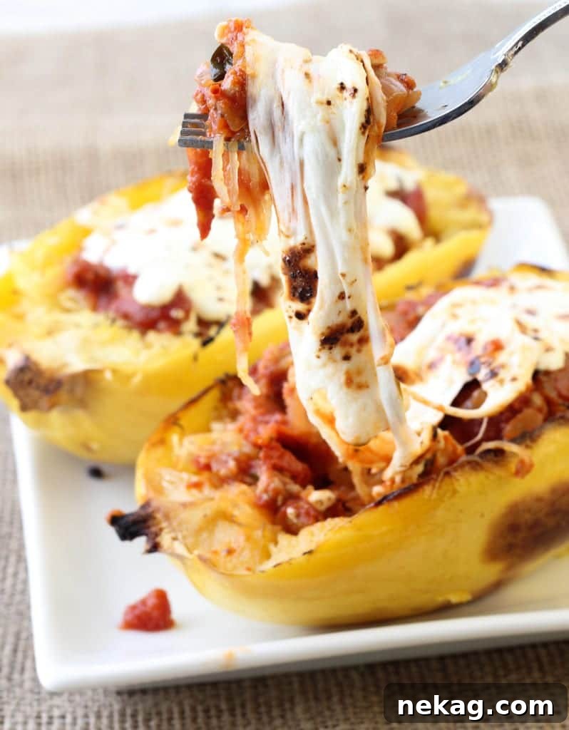 A whole spaghetti squash on a rustic wooden table, ready for cooking