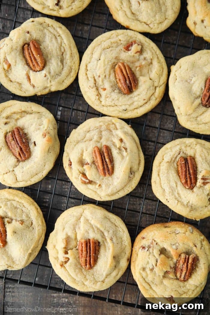 Close-up of Butter Pecan Cookies, highlighting their soft texture and pecan topping.