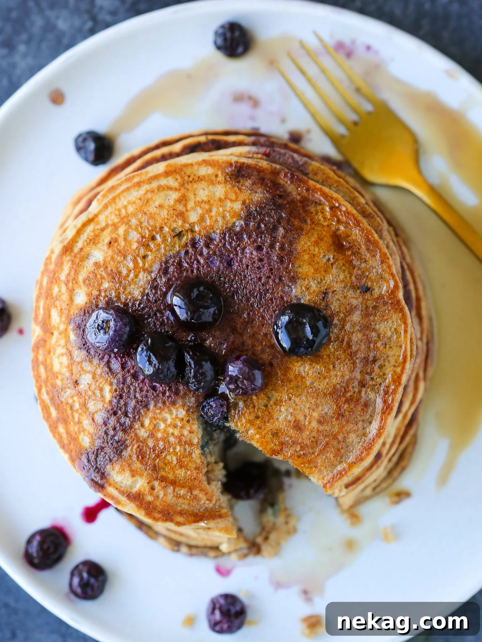 Close-up of a single whole wheat pancake with blueberries