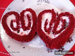 Velvet Love Bites 4 Two pieces of Red Velvet Cake Hearts beautifully arranged, showcasing their perfect heart shape and delicious layers.