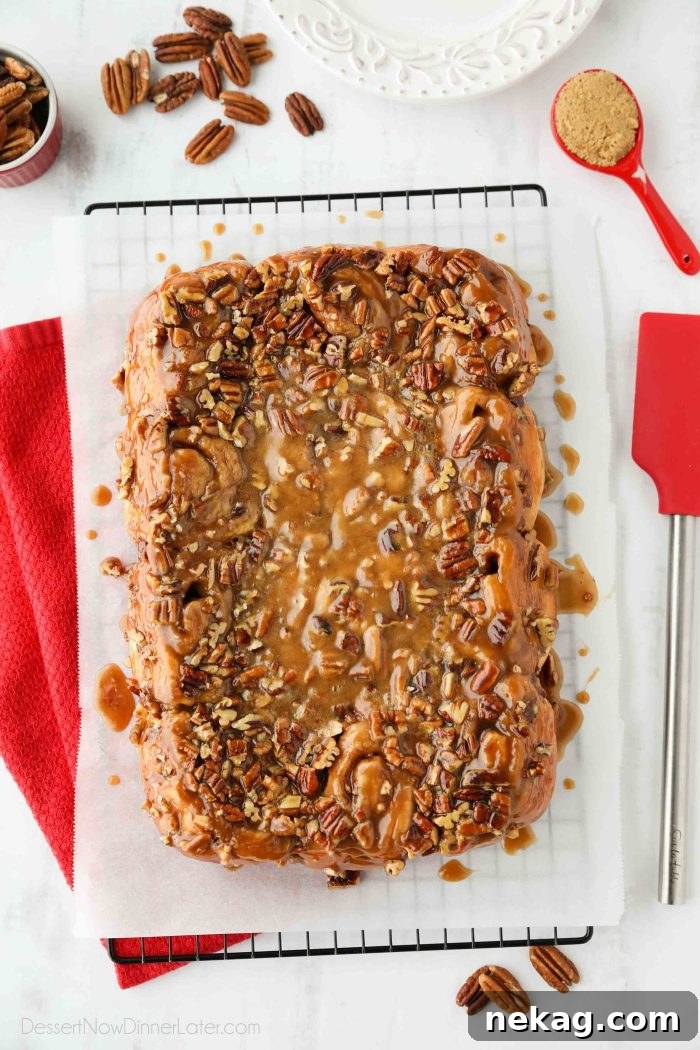 These easy caramel pecan rolls are so sticky, gooey, and delicious. They're made with frozen cinnamon rolls so half the work is done for you! Perfect for holidays or weekends.