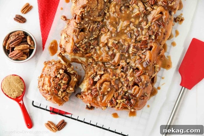 These easy caramel pecan rolls are so sticky, gooey, and delicious. They're made with frozen cinnamon rolls so half the work is done for you! Perfect for holidays or weekends.