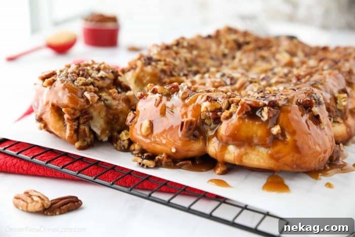 These easy caramel pecan rolls are so sticky, gooey, and delicious. They're made with frozen cinnamon rolls so half the work is done for you! Perfect for holidays or weekends.